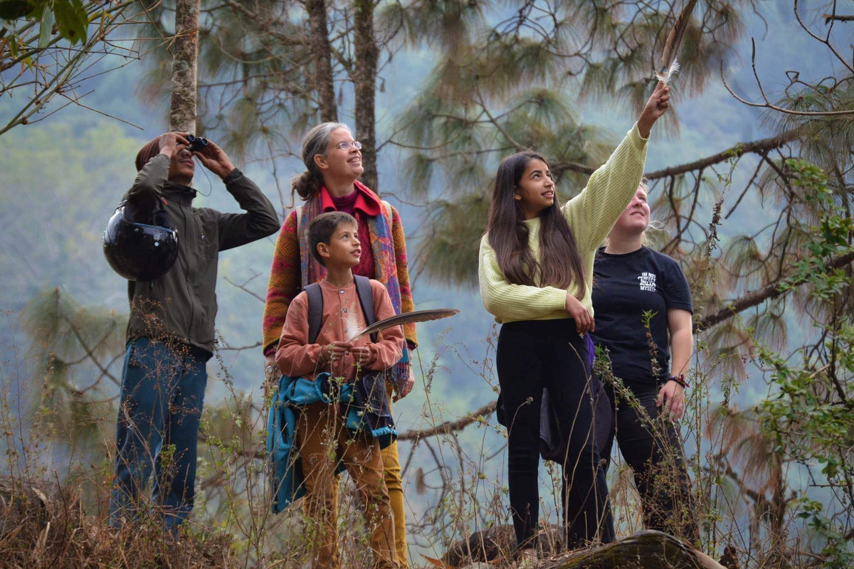 Ecotourists observing vultures